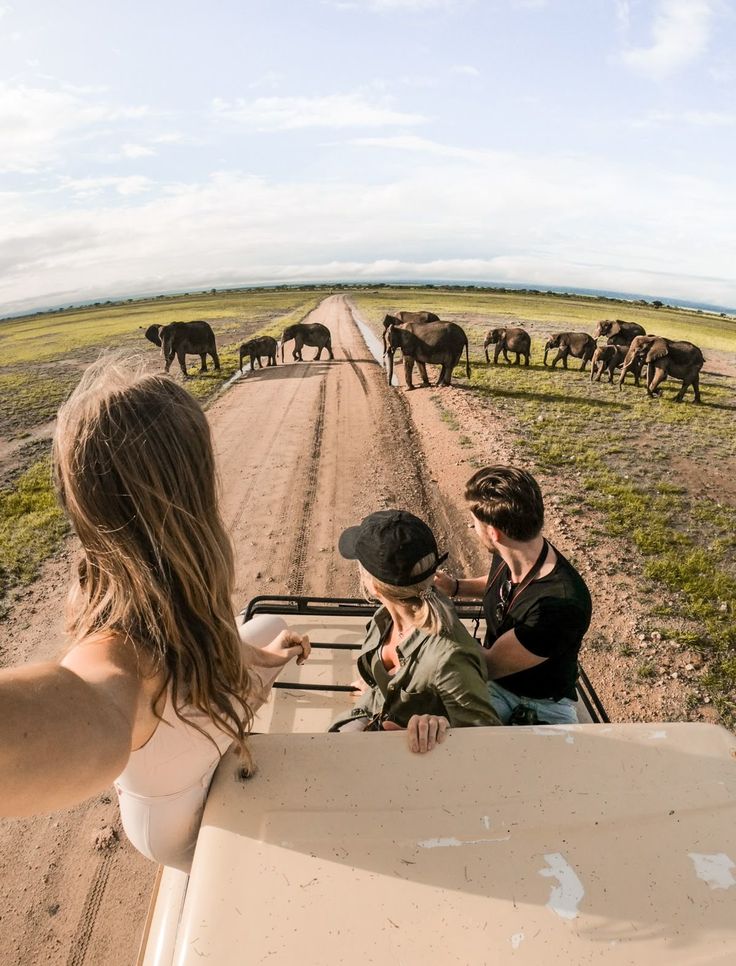 travelers on a 4x4 car rental tanzania safari